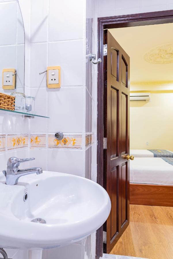 Cosmo Square Hotel Ho Chi Minh-stad Buitenkant foto