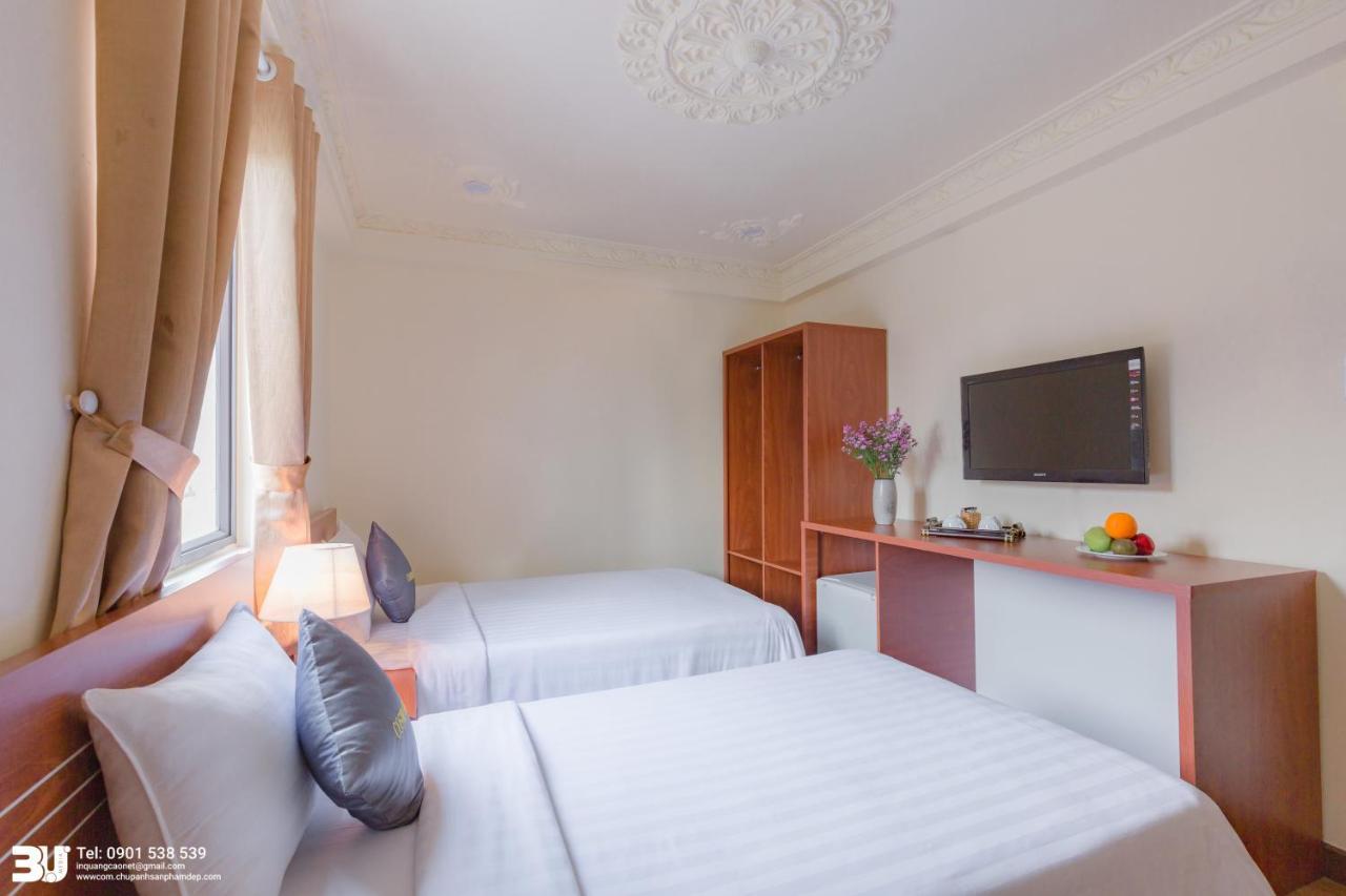 Cosmo Square Hotel Ho Chi Minh-stad Buitenkant foto
